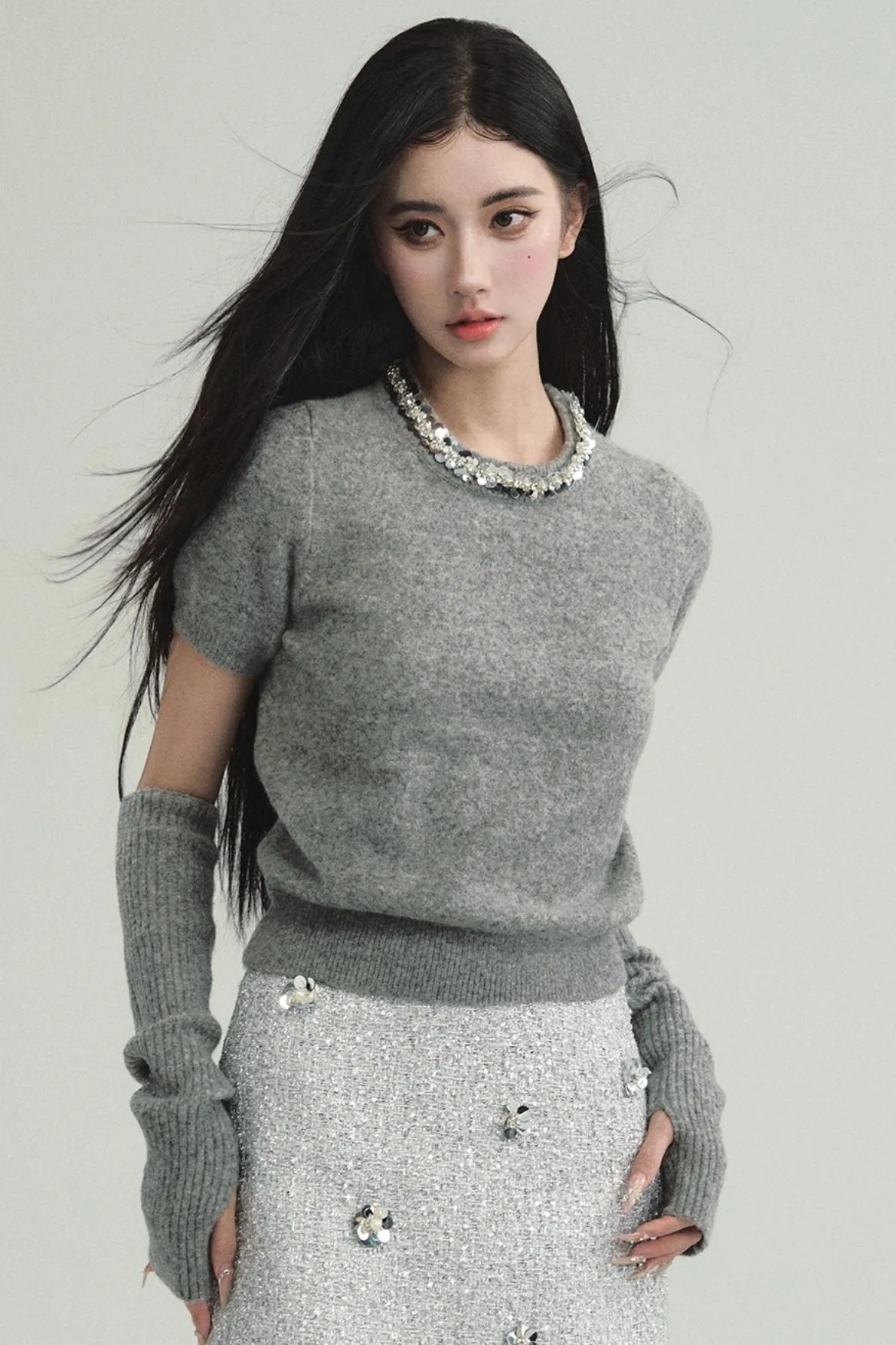 Elegant Layered Look: Pearl-Trimmed Cropped Sweater with Detachable Arm Warmers